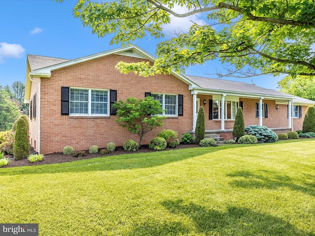 6505 Morningside Ct, Middletown, MD 21769 - ranch-style home featuring brick siding, a porch, and a front lawn