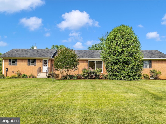6505 Morningside Ct, Middletown, MD 21769 - view of front of house with brick siding, a front lawn, and a chimney