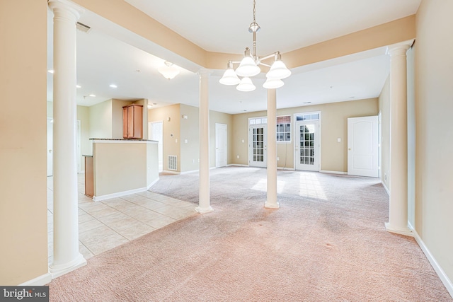 9711 Handerson Pl Unit 206, Manassas Park, VA 20111 - empty room featuring light carpet, decorative columns, a chandelier, and light tile patterned floors