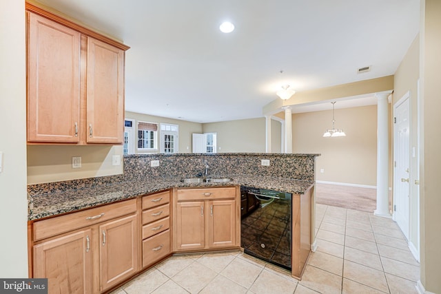 9711 Handerson Pl Unit 206, Manassas Park, VA 20111 - kitchen featuring dishwasher, ornate columns, a peninsula, light brown cabinetry, and light tile patterned flooring