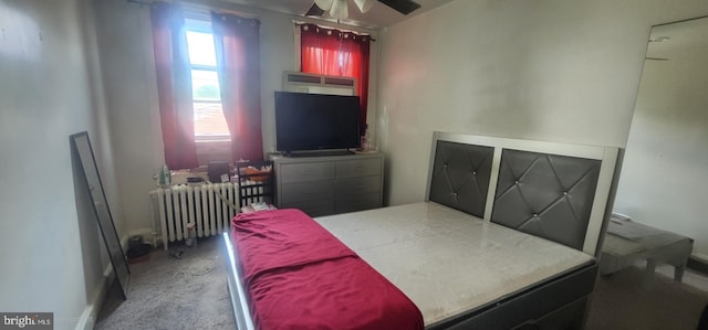 2308 W Mosher St, Baltimore, MD 21216 - carpeted bedroom featuring radiator heating unit and a desk