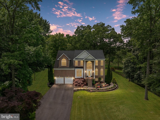 1015 S Creek View Ct, Churchton, MD 20733 - traditional-style home featuring driveway, a garage, a yard, and stucco siding