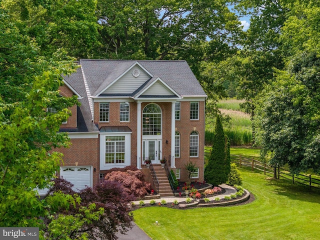 1015 S Creek View Ct, Churchton, MD 20733 - view of front of property with brick siding, a garage, french doors, and view of wooded area