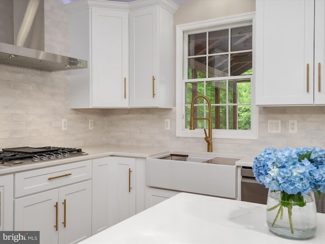1015 S Creek View Ct, Churchton, MD 20733 - kitchen with wall chimney exhaust hood, stainless steel gas stovetop, light countertops, and tasteful backsplash