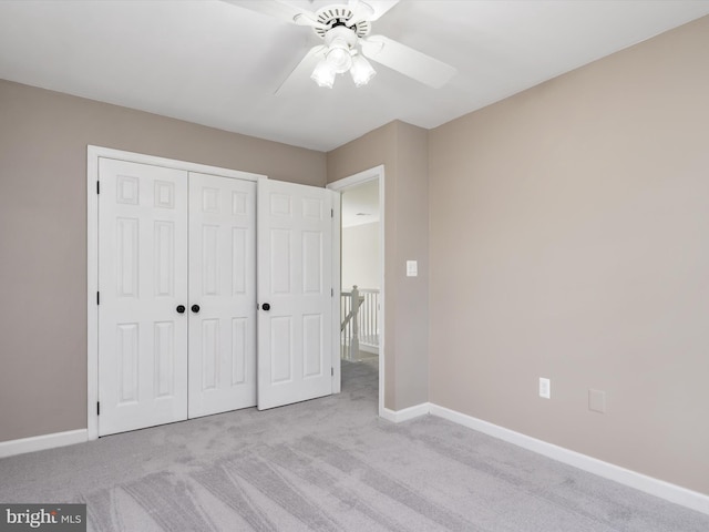 1015 S Creek View Ct, Churchton, MD 20733 - unfurnished bedroom with carpet, a closet, and a ceiling fan