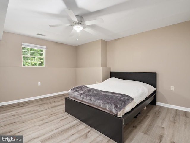 1015 S Creek View Ct, Churchton, MD 20733 - bedroom with light wood finished floors and a ceiling fan
