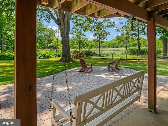 1015 S Creek View Ct, Churchton, MD 20733 - view of patio featuring an outdoor fire pit and view of wooded area