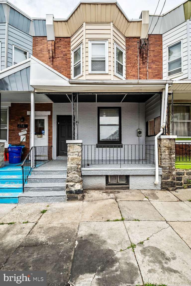 2750 N 28th St, Philadelphia, PA 19132 - view of front of property featuring a porch and brick siding