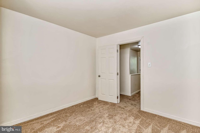 2750 N 28th St, Philadelphia, PA 19132 - empty room with light colored carpet and baseboards
