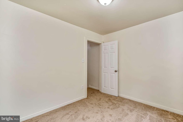 2750 N 28th St, Philadelphia, PA 19132 - spare room featuring carpet flooring and baseboards