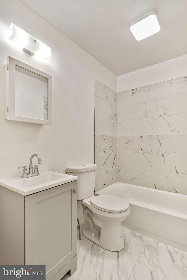 2750 N 28th St, Philadelphia, PA 19132 - bathroom featuring vanity, marble look tiles, and bathing tub / shower combination