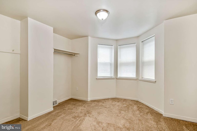 2750 N 28th St, Philadelphia, PA 19132 - unfurnished room with light carpet and baseboards