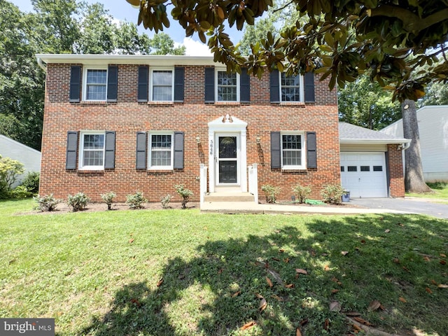 5646 Mount Burnside Way, Burke, VA 22015 - colonial home featuring a garage, a front yard, brick siding, and driveway