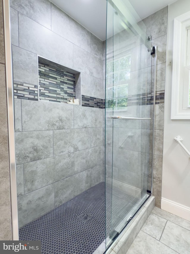 5646 Mount Burnside Way, Burke, VA 22015 - full bathroom featuring a stall shower and baseboards