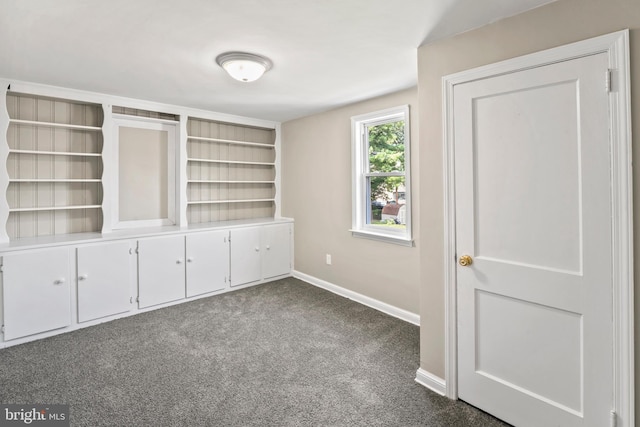 51 E Ann Rd, Broomall, PA 19008 - unfurnished room with baseboards and dark carpet
