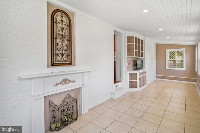 51 E Ann Rd, Broomall, PA 19008 - unfurnished living room with light tile patterned floors, recessed lighting, wooden ceiling, built in features, and a fireplace