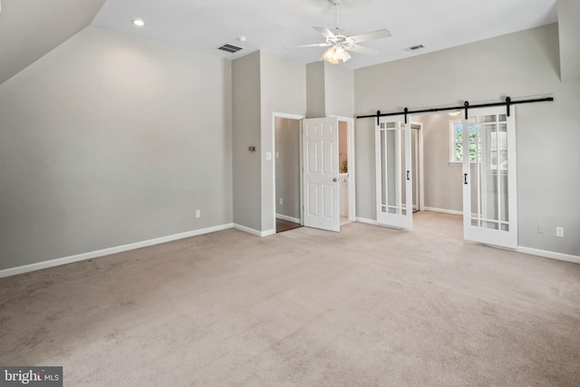 51 E Ann Rd, Broomall, PA 19008 - unfurnished bedroom with carpet flooring, a barn door, high vaulted ceiling, recessed lighting, and a ceiling fan