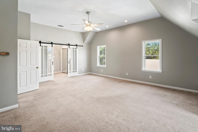 51 E Ann Rd, Broomall, PA 19008 - unfurnished bedroom featuring vaulted ceiling, a barn door, carpet floors, recessed lighting, and a ceiling fan