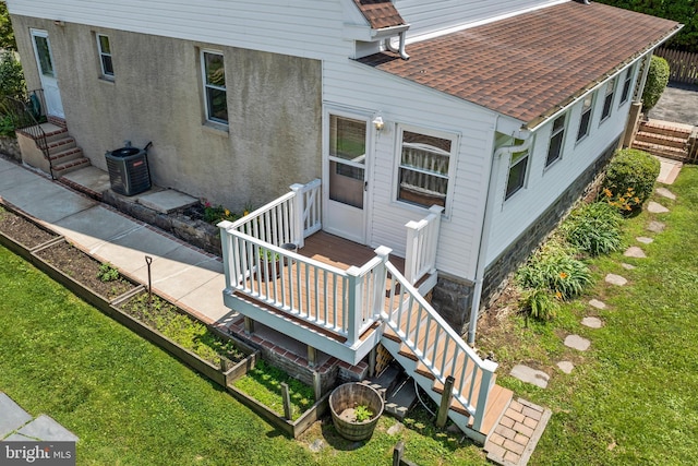 51 E Ann Rd, Broomall, PA 19008 - rear view of house with a shingled roof and a yard
