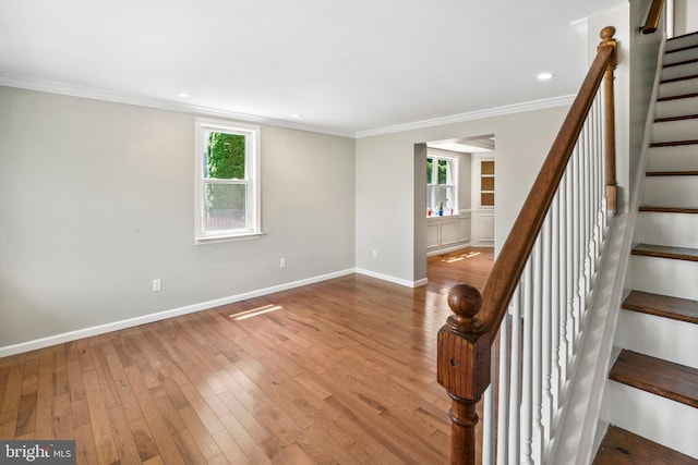 51 E Ann Rd, Broomall, PA 19008 - unfurnished room featuring wood finished floors, crown molding, stairs, healthy amount of natural light, and recessed lighting