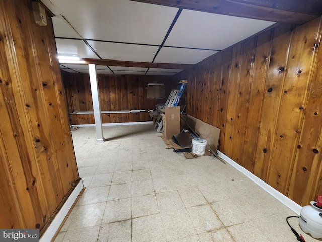 3137 Oakford Ave, Baltimore, MD 21215 - unfurnished bedroom featuring wood walls and tile patterned floors