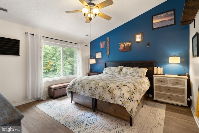 3086 Bridgeton Ct, Woodbridge, VA 22192 - bedroom featuring vaulted ceiling, wood finished floors, and ceiling fan