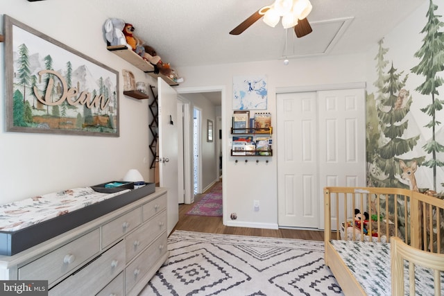 3086 Bridgeton Ct, Woodbridge, VA 22192 - bedroom with a closet, wood finished floors, attic access, and ceiling fan