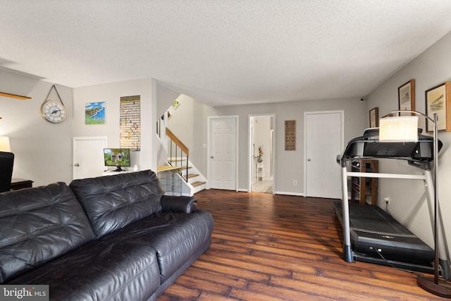 3086 Bridgeton Ct, Woodbridge, VA 22192 - living area featuring stairs, wood finished floors, and a textured ceiling