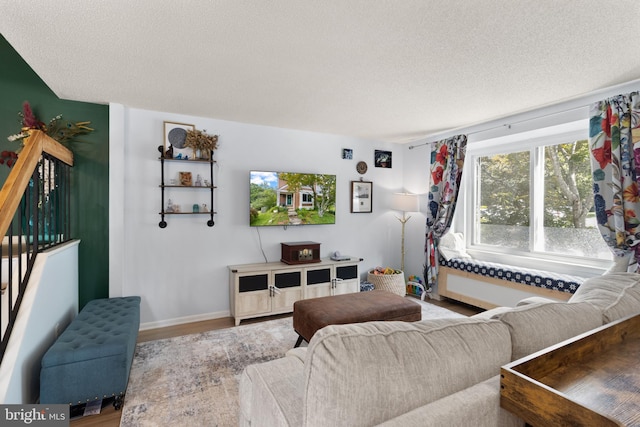 3086 Bridgeton Ct, Woodbridge, VA 22192 - living area with a textured ceiling and wood finished floors