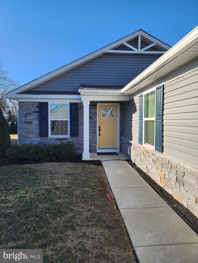 100 Senators Way, Berlin, NJ 08009 - property entrance featuring stone siding and a yard