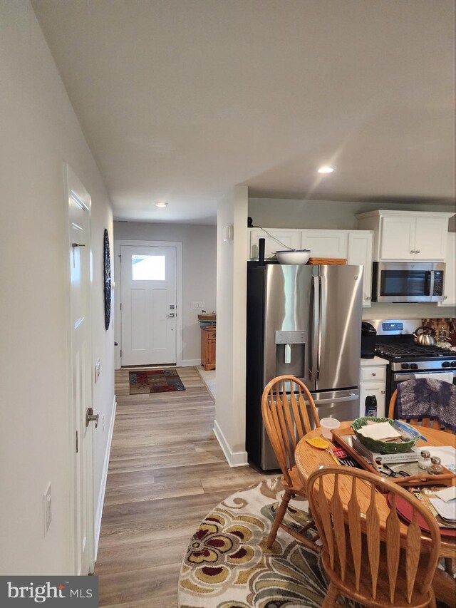 100 Senators Way, Berlin, NJ 08009 - kitchen featuring appliances with stainless steel finishes, light wood-style flooring, white cabinetry, and recessed lighting