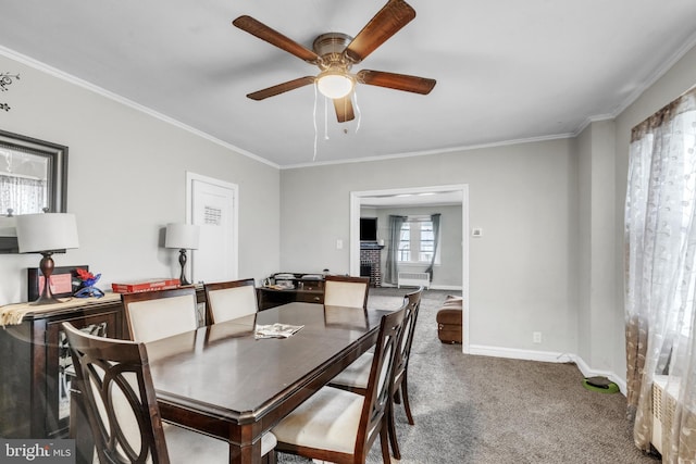 438 Holly Rd, Lansdowne, PA 19050 - dining space with carpet flooring, a ceiling fan, and crown molding
