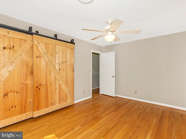 4431 Cherry Tree Ln, Sykesville, MD 21784 - unfurnished bedroom featuring wood finished floors and ceiling fan