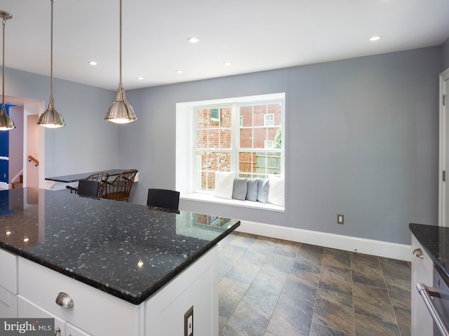 319 W Conestoga Rd, Devon, PA 19333 - kitchen with white cabinets, dark stone countertops, recessed lighting, and decorative light fixtures