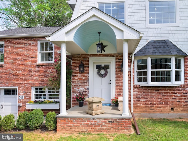 319 W Conestoga Rd, Devon, PA 19333 - entrance to property with brick siding and a shingled roof