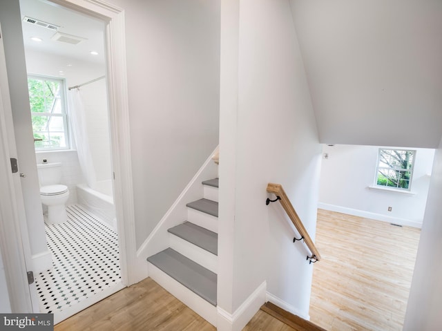 319 W Conestoga Rd, Devon, PA 19333 - stairway featuring plenty of natural light and wood finished floors