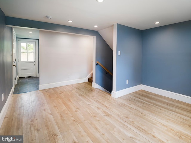 319 W Conestoga Rd, Devon, PA 19333 - unfurnished room featuring a smoke detector, wood finished floors, recessed lighting, and stairway
