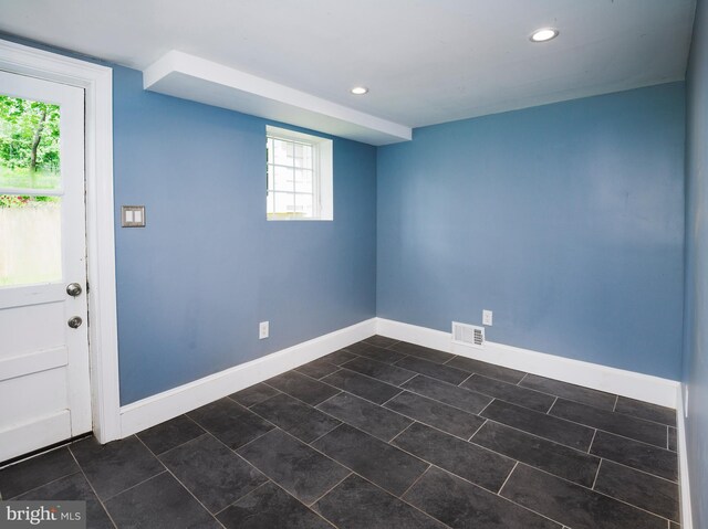 319 W Conestoga Rd, Devon, PA 19333 - empty room with recessed lighting and dark tile patterned flooring