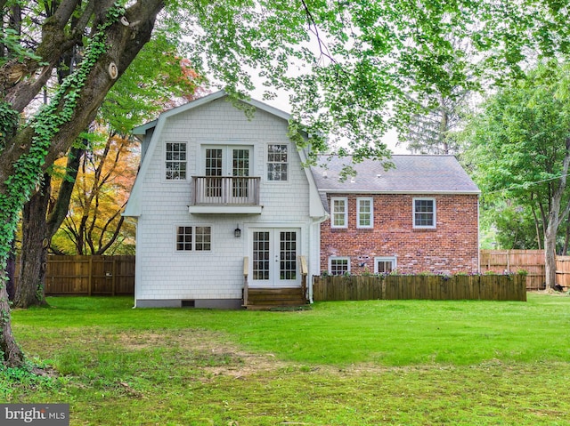 319 W Conestoga Rd, Devon, PA 19333 - back of property featuring french doors, entry steps, and a fenced backyard