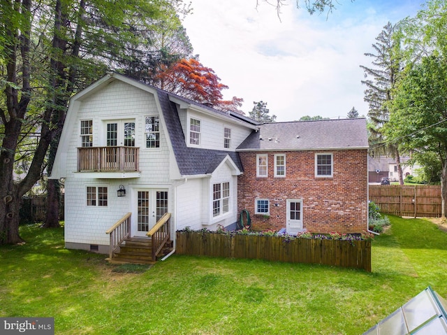 319 W Conestoga Rd, Devon, PA 19333 - rear view of property featuring french doors, roof with shingles, a balcony, and a gambrel roof
