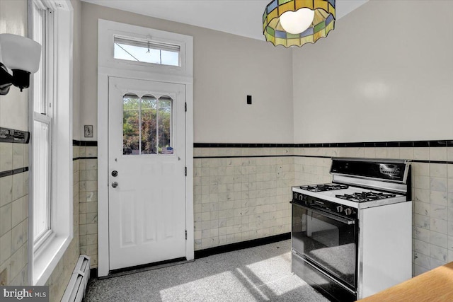 1243 Buttonwood St, Reading, PA 19604 - foyer featuring tile walls, wainscoting, and baseboard heating