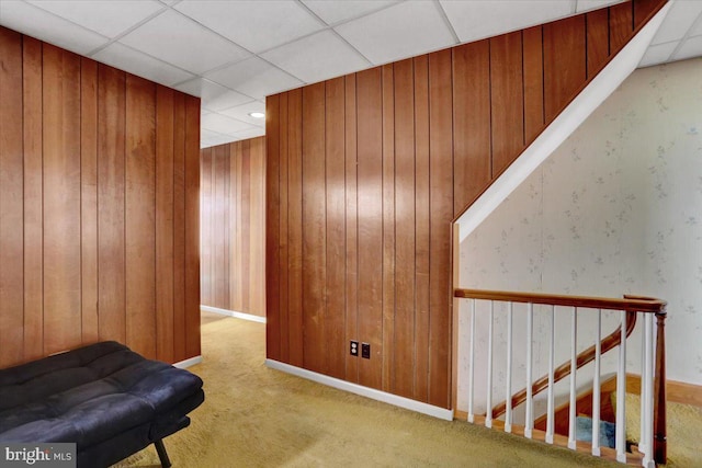 1243 Buttonwood St, Reading, PA 19604 - hallway featuring carpet flooring, a drop ceiling, and wooden walls