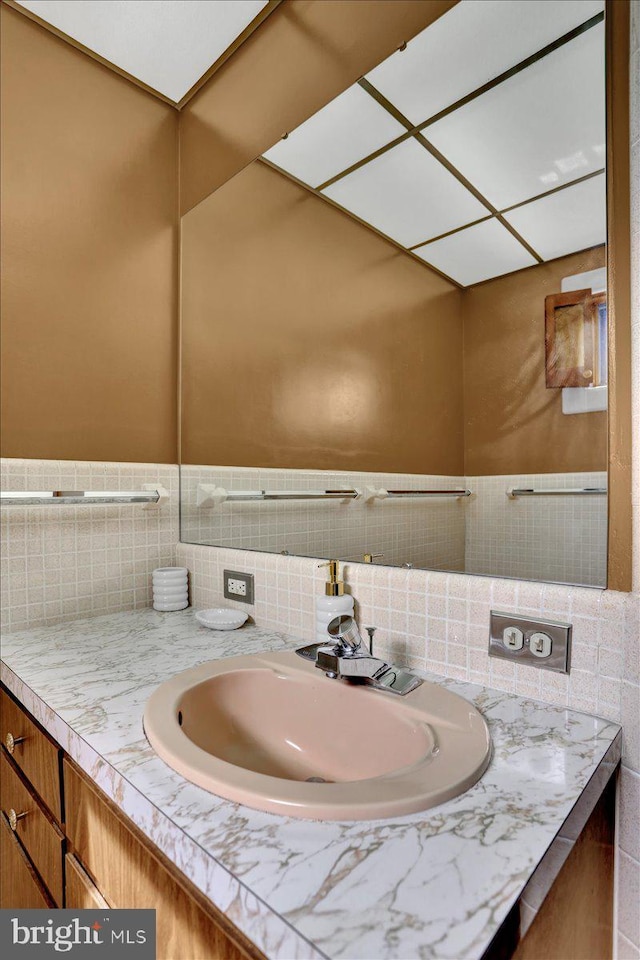 1243 Buttonwood St, Reading, PA 19604 - bathroom with vanity and backsplash