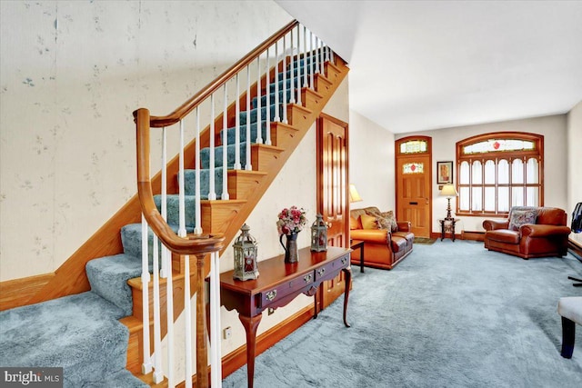1243 Buttonwood St, Reading, PA 19604 - living room with stairway and carpet flooring