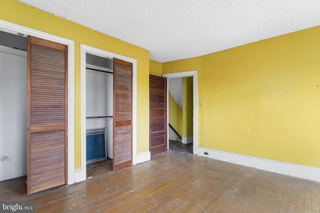 29 N Maple Ave, Lansdowne, PA 19050 - unfurnished bedroom featuring hardwood / wood-style flooring and a textured ceiling