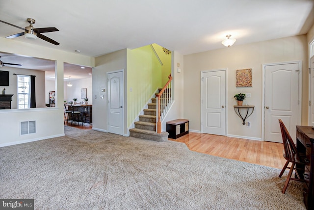 1814 S Pollock Way, Middletown, DE 19709 - living room with stairway, ceiling fan, and carpet flooring