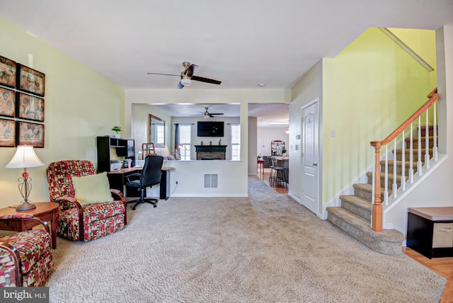 1814 S Pollock Way, Middletown, DE 19709 - carpeted office space featuring a ceiling fan and a fireplace