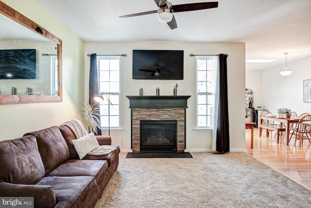 1814 S Pollock Way, Middletown, DE 19709 - living room with a ceiling fan, plenty of natural light, carpet floors, and a fireplace