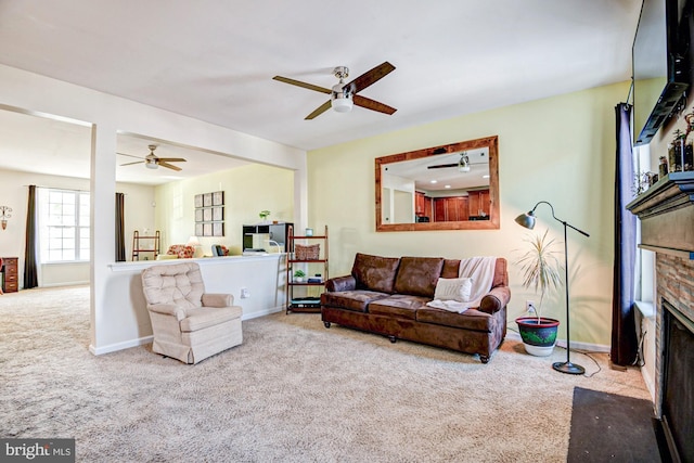 1814 S Pollock Way, Middletown, DE 19709 - living area featuring a ceiling fan, carpet floors, and a fireplace with flush hearth