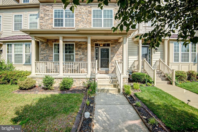 1814 S Pollock Way, Middletown, DE 19709 - view of front of house with stone siding, covered porch, and a front yard